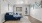a living room with a blue couch